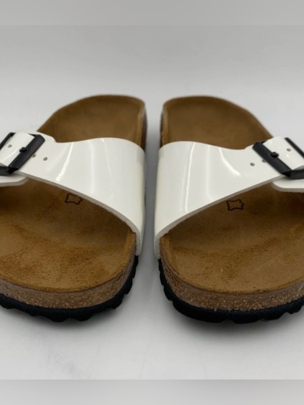 Birkenstock White Single-Strap Slide Sandals with Black Buckle